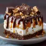 Butterfinger Candy Bar Poke Cake Recipe